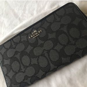 Coach smoke/black wristlet